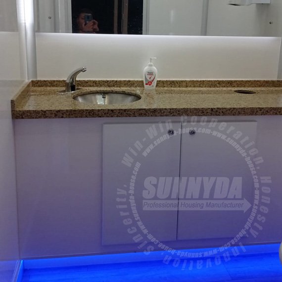 Brown marble vanity for luxury portable toilet trailer