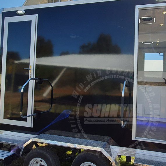 black luxury portable toilet trailer use in event