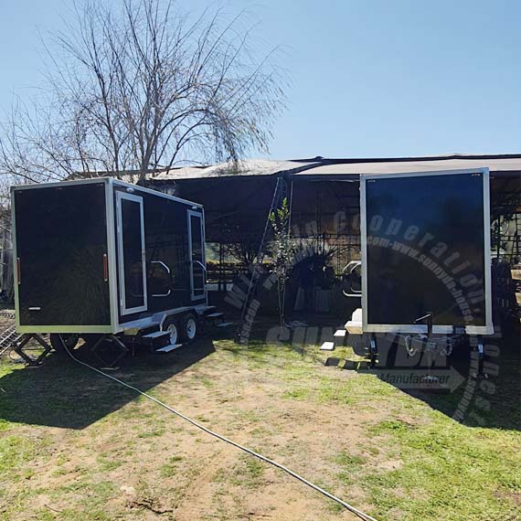 double vip toilet trailer in use
