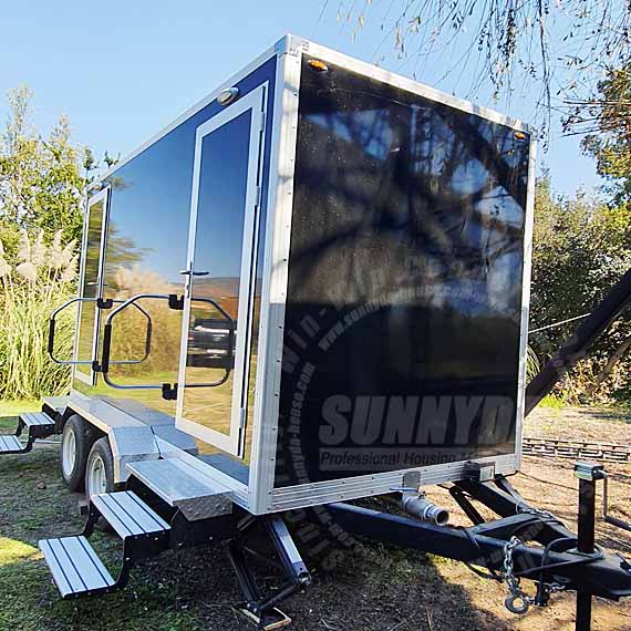 luxury portable toilet trailer in garden